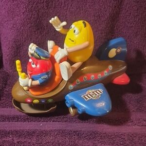 M&M's Vibrant Toy Plane Candy Dispenser with Yelliw And Red Characters
